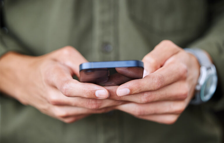 responding to communication on his phone